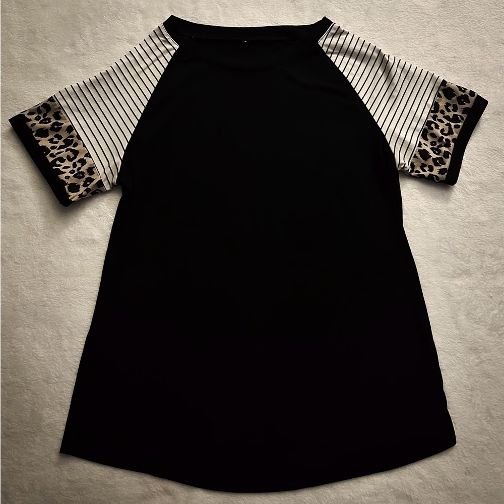 Amazon blouse with printed sleeves.
